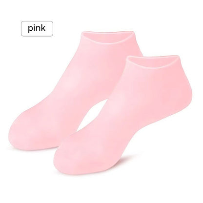 Pink gel moisturizing silicone socks for cracked heel care and hydration. Reusable indoor foot care socks in beauty and personal care category.